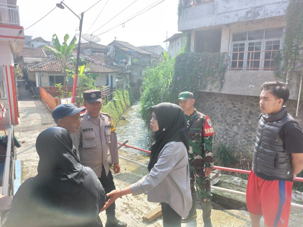 Bhabinkamtibmas Polsek Cikole beserta Babinsa Laksanakan Monitoring Wilayah