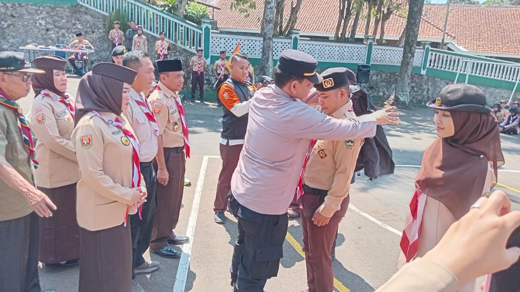 Kapolsek Sukalarang Hadiri Pelepasan Peserta Kontingen Pramuka Raimuna Nasional Ke XIV Tahun 2024