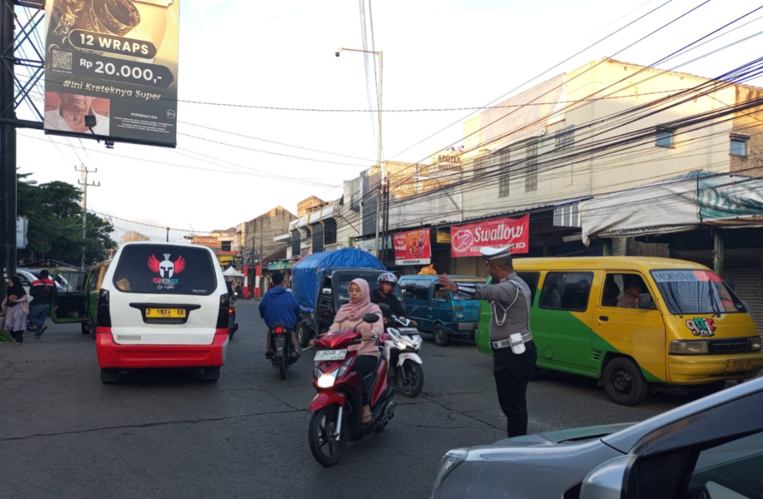 Polsek Wanaraja Gelar Gatur Pagi, Pastikan Keamanan Jalur Sekolah dan Pasar