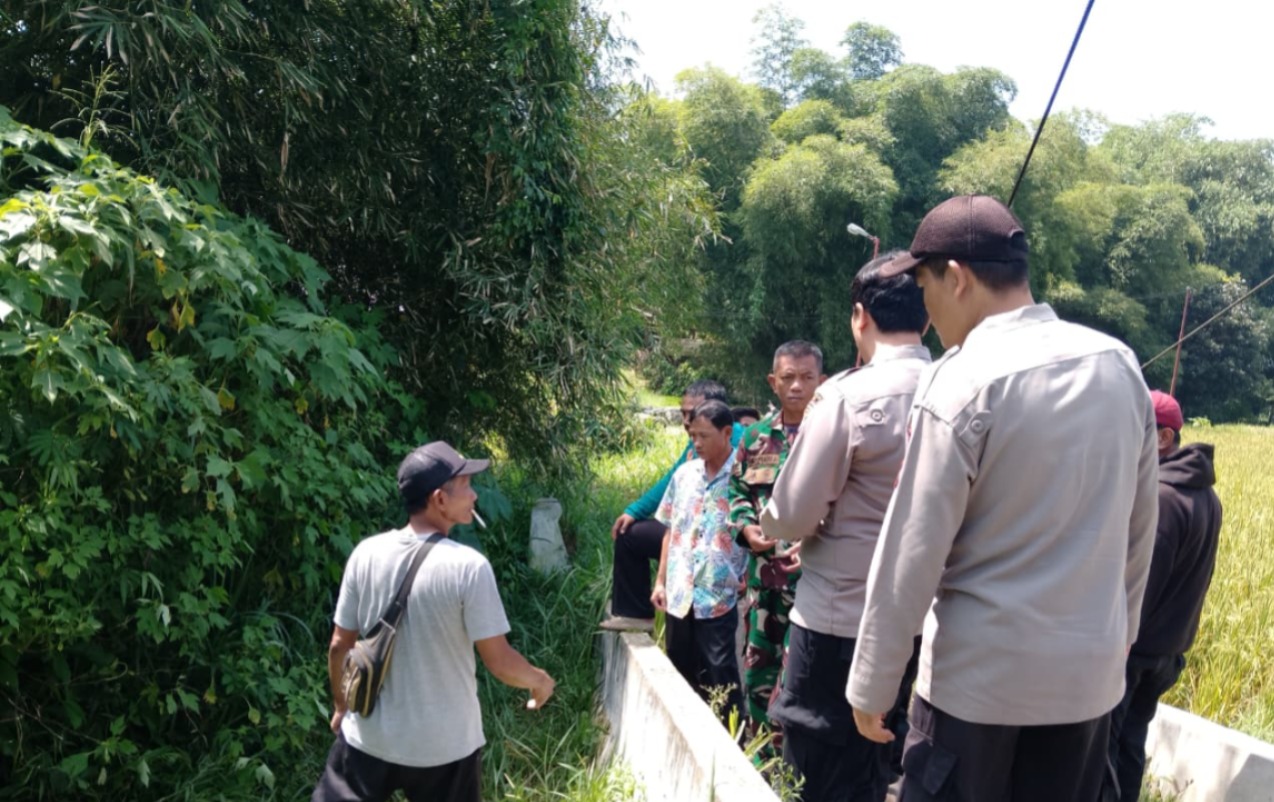 Polsek Karangpawitan Lakukan Pencarian Korban Hanyut di Sungai Cimanuk